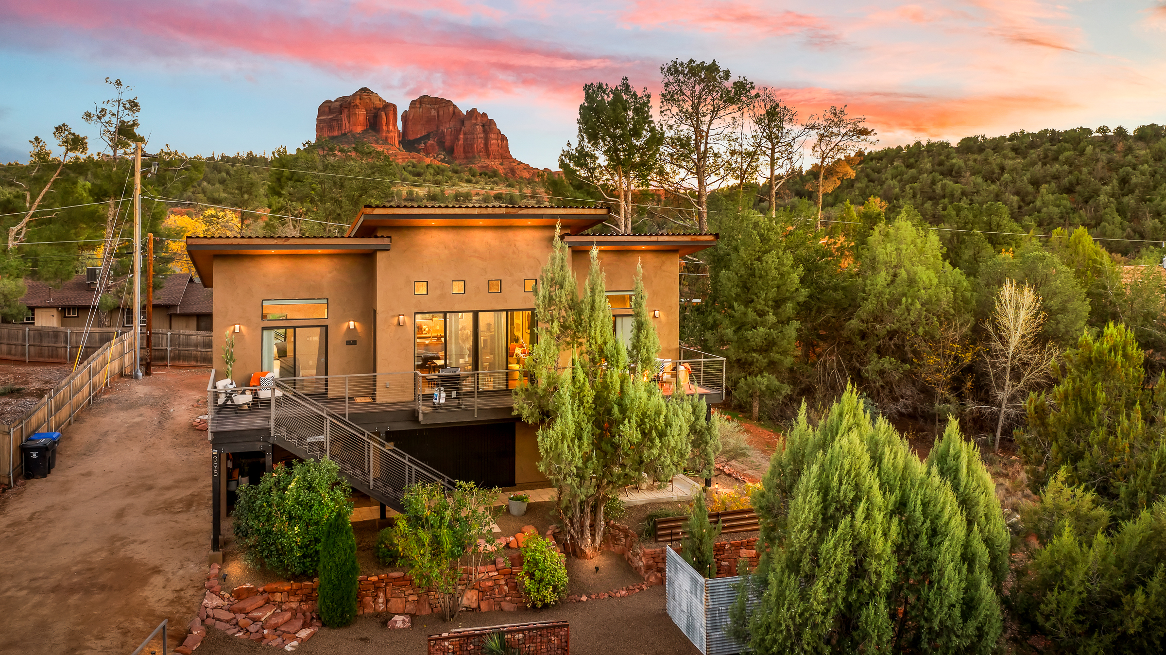 Guesthouse located beneath the main home, set against iconic Sedona red rock views and surrounded by peaceful desert landscape.