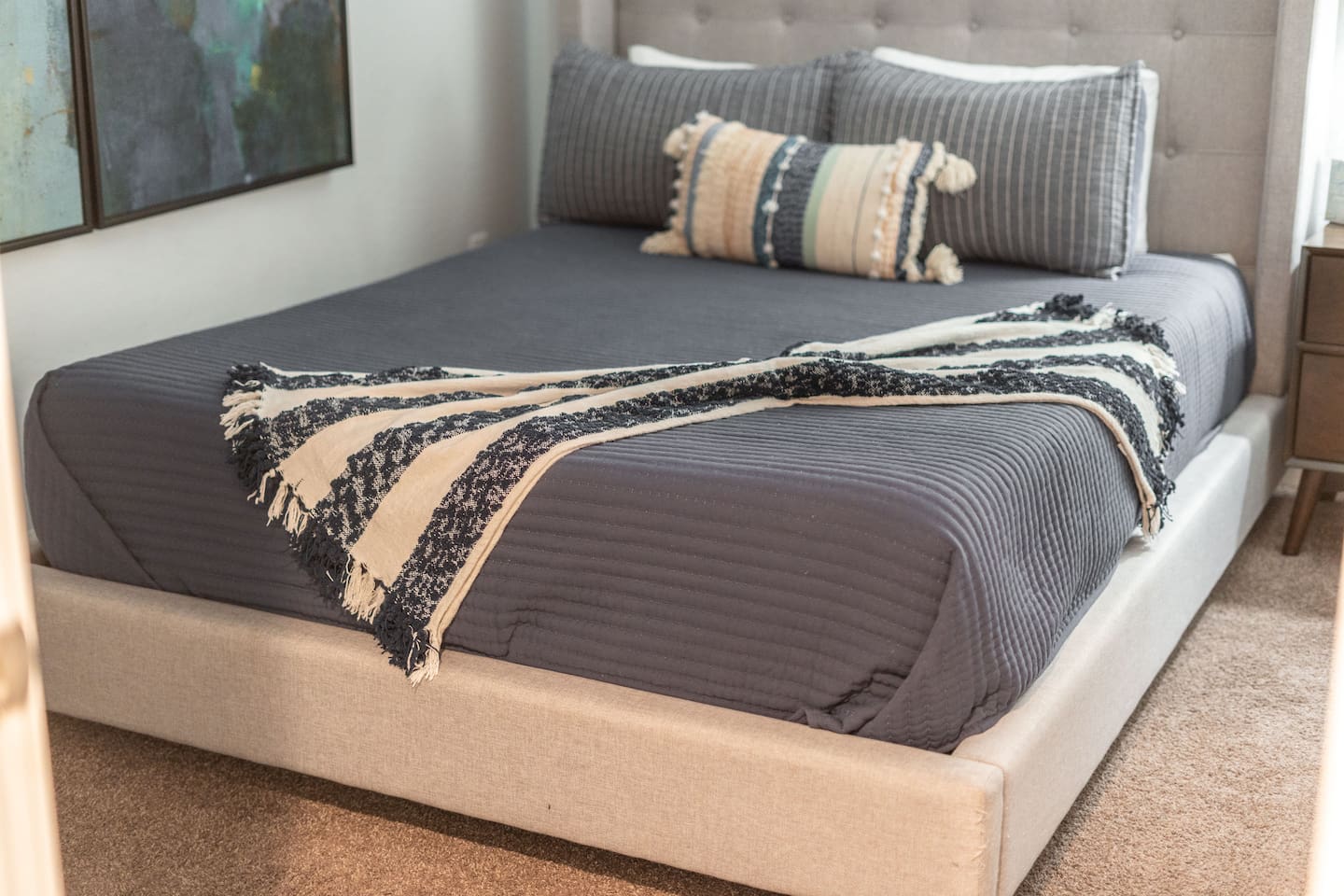 Our queen-sized bed, designed for ultimate comfort and a restful night's sleep.