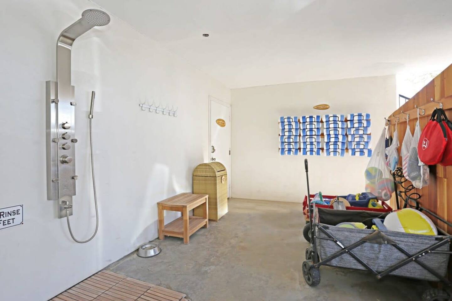 Plenty of beach towels and our third outdoor shower to rinse down after the beach.