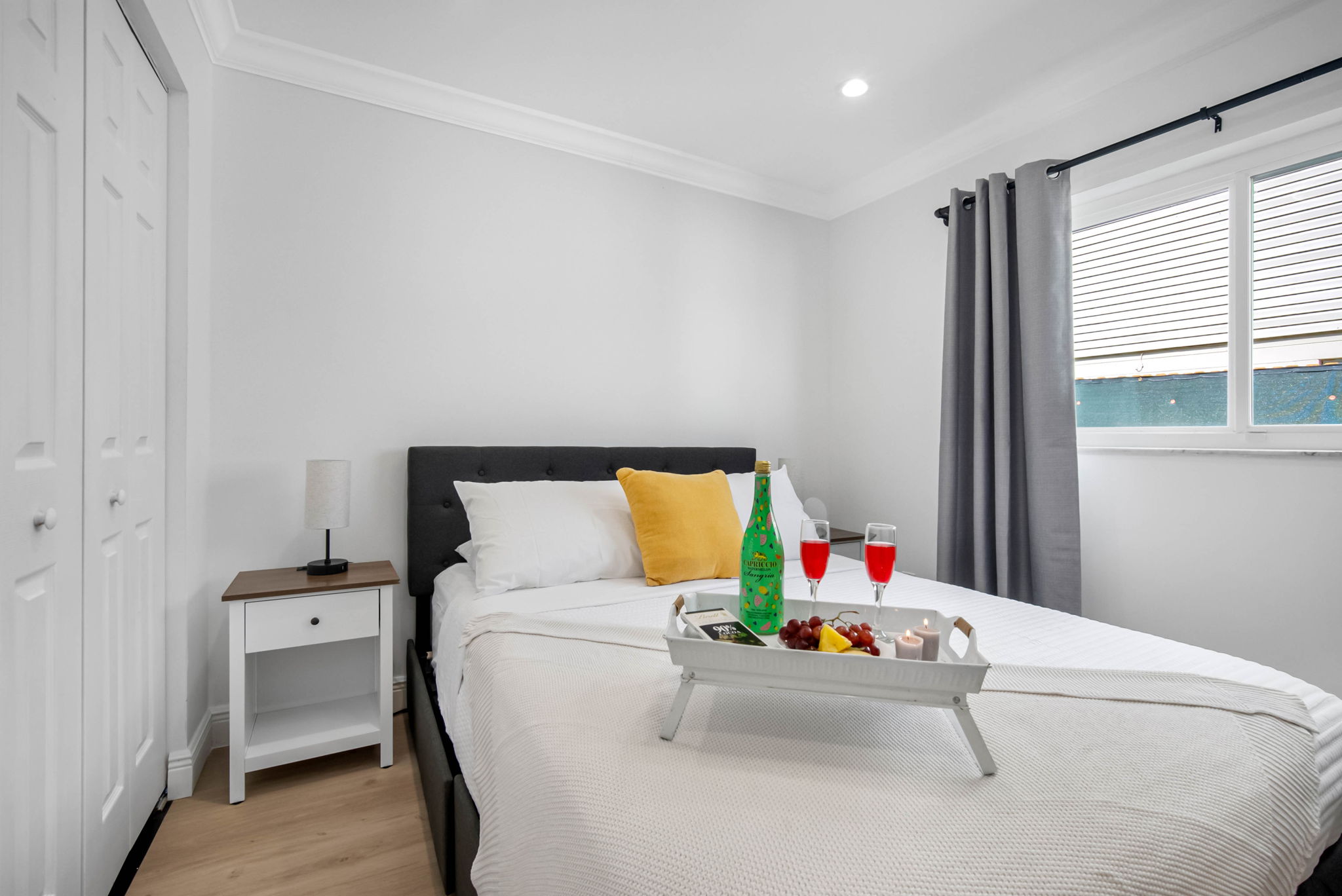 Natural light floods the space, highlighting the clean aesthetic and thoughtful touches.