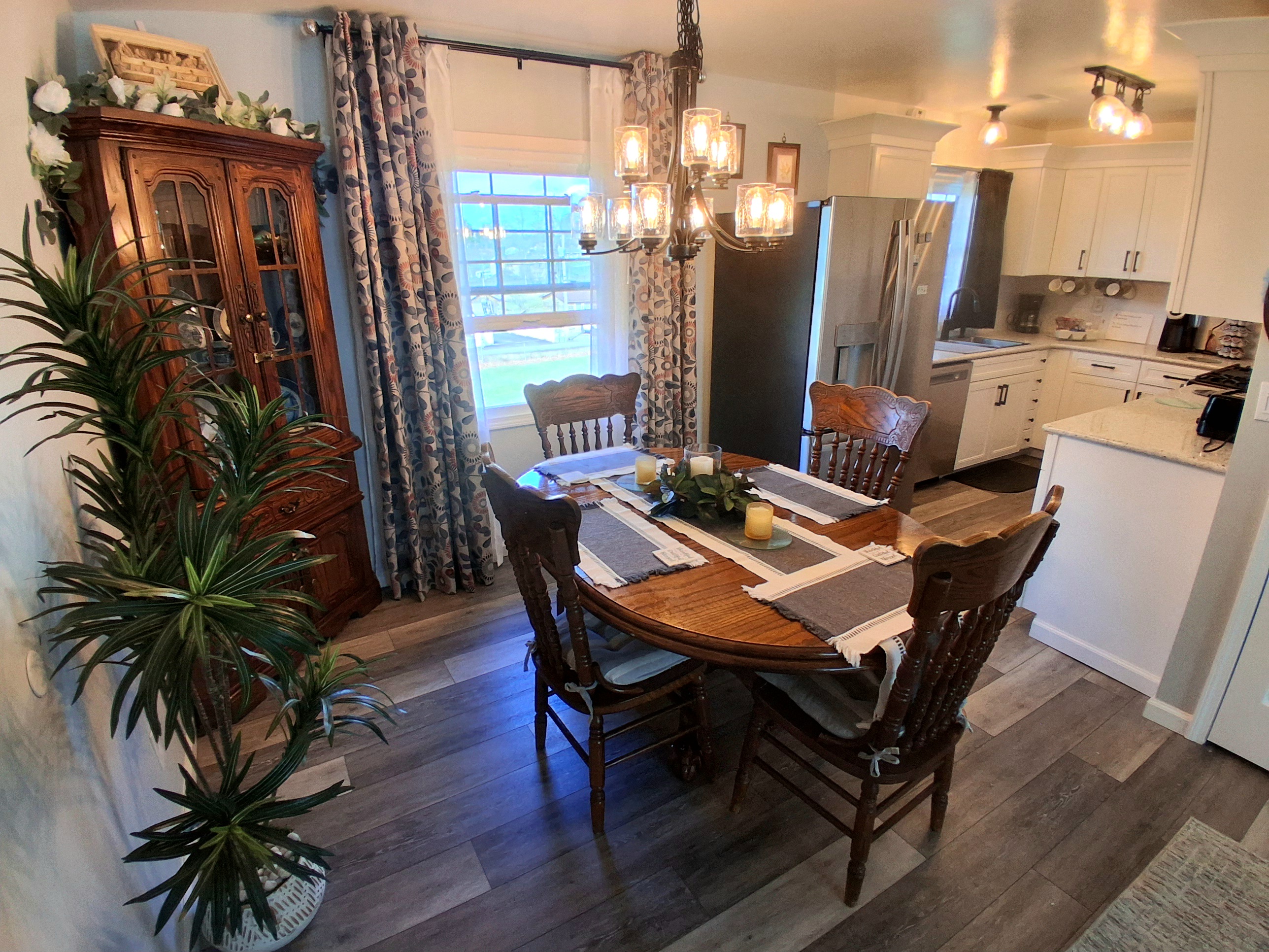 I love listening to the birds while sipping my morning coffee or enjoying breakfast at the table by the open window. The Whirlpool fridge includes a water dispenser and pull-out freezer, making it easy to stay refreshed throughout the day.