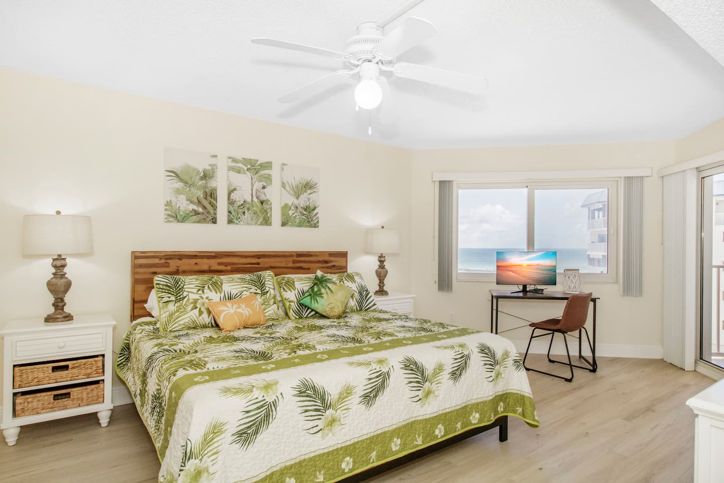 King size master bedroom with pool/gulf views and patio access. 