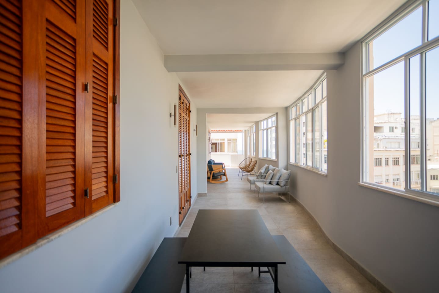Covered terrace leading to open terrace.  All new windows that open widely for fresh breezes!