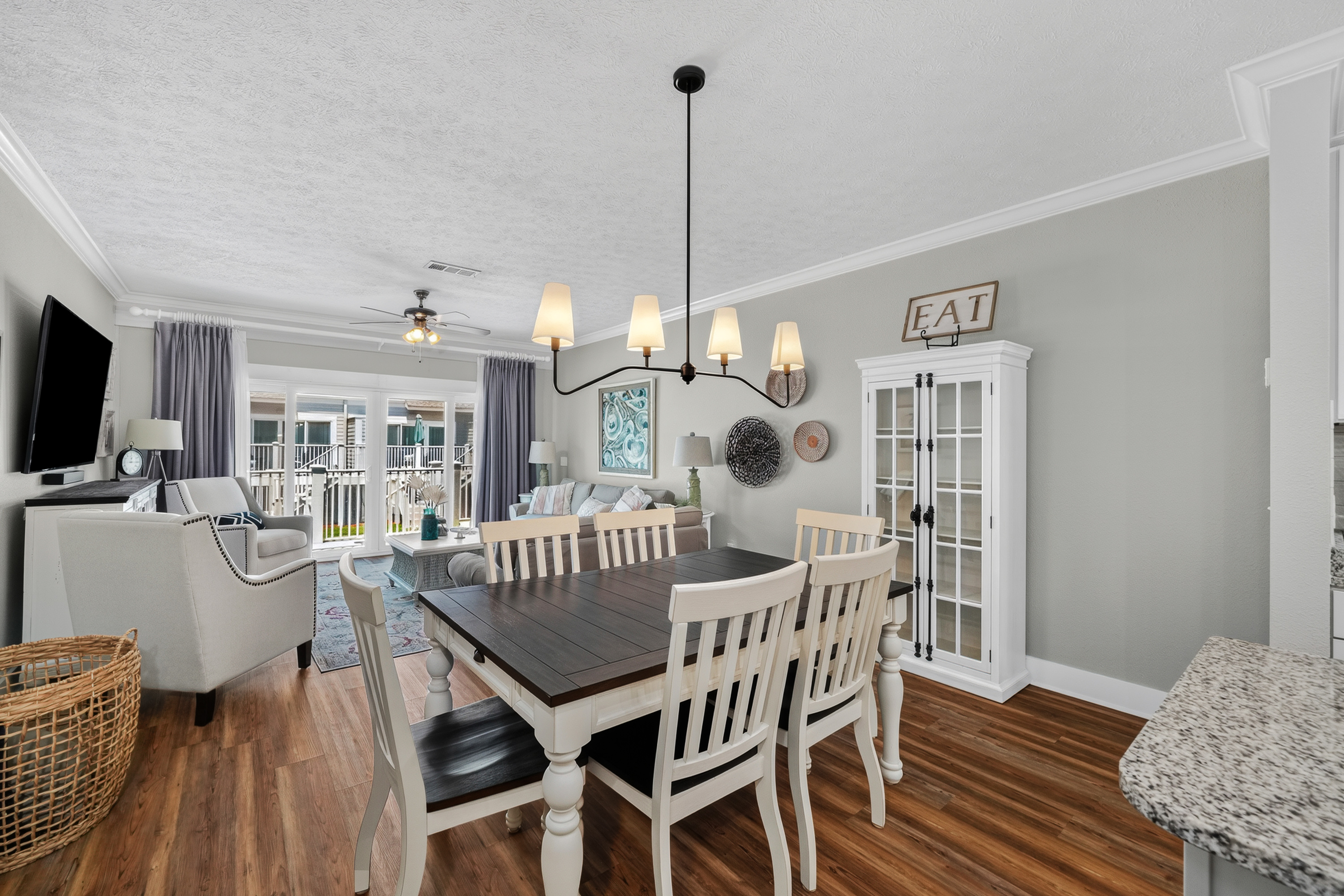 Spacious dining area with seating for 6, perfect for family meals and game nights.