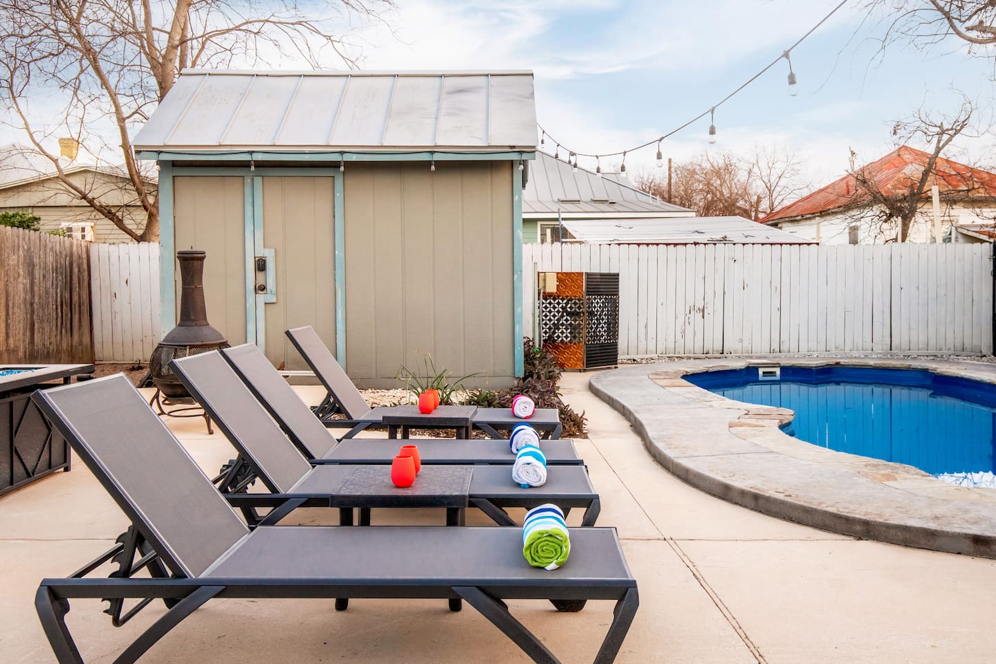 Our poolside lounge area is ready for your day of sunbathing or an evening of stargazing, complete with comfortable loungers, colorful towels, and silicone glasses to enjoy your drinks in.