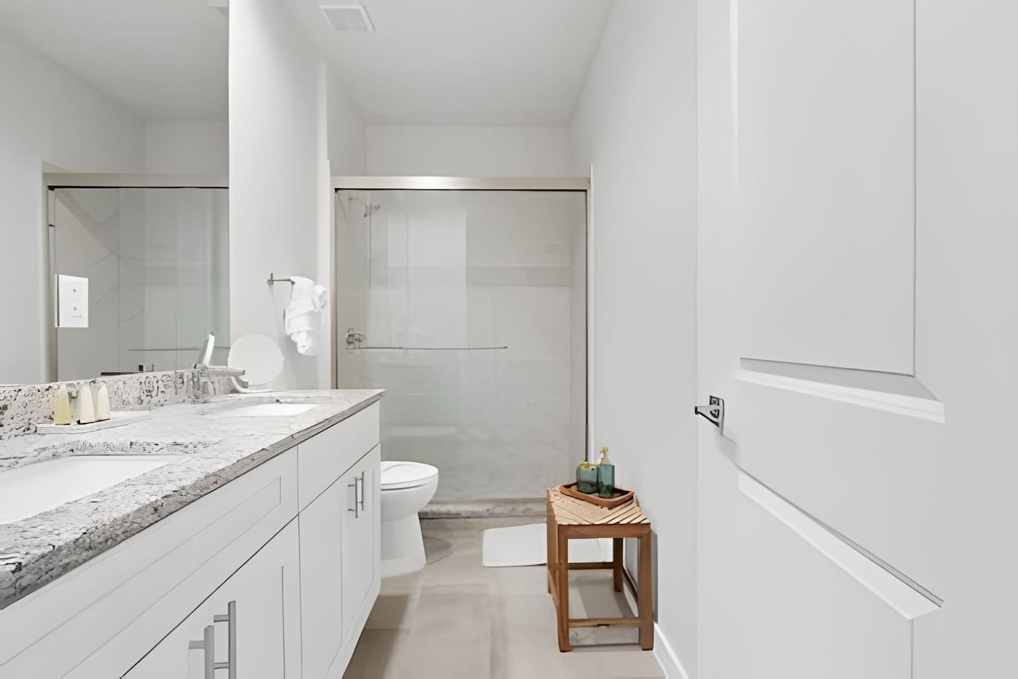Modern bathroom with sleek finishes, offering both style and functionality for your comfort.