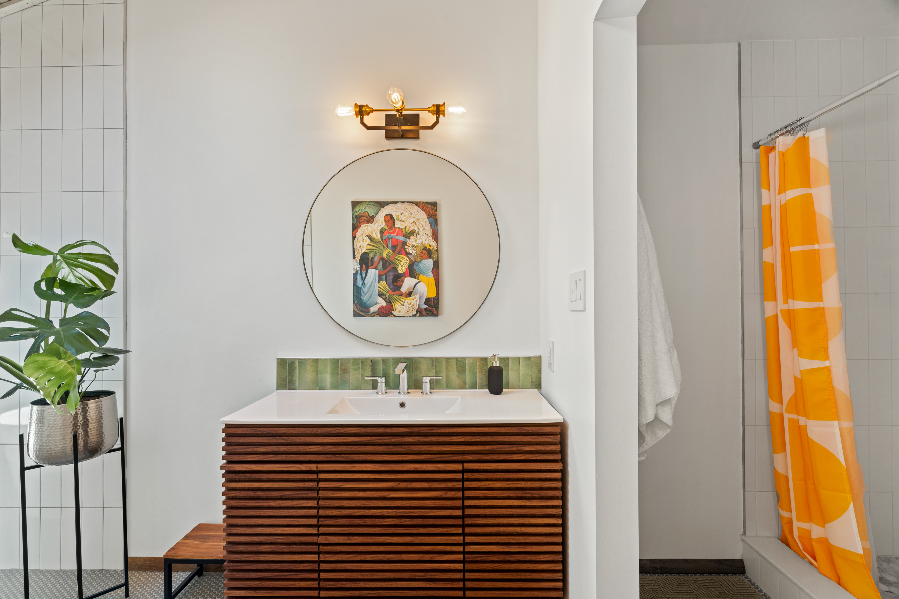 Master bath showing shower and vanity