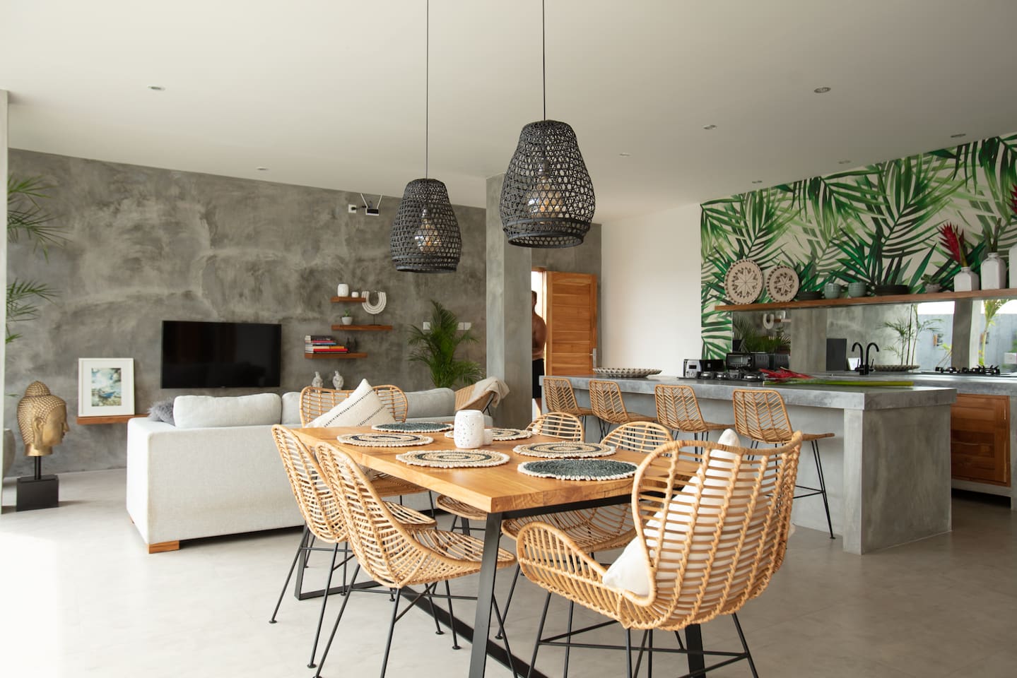 Another view of this harmonious living space, where the interior blends seamlessly with the surrounding gardens.