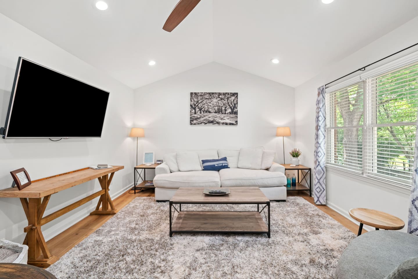 Open layout, high ceilings & comfy couch!
