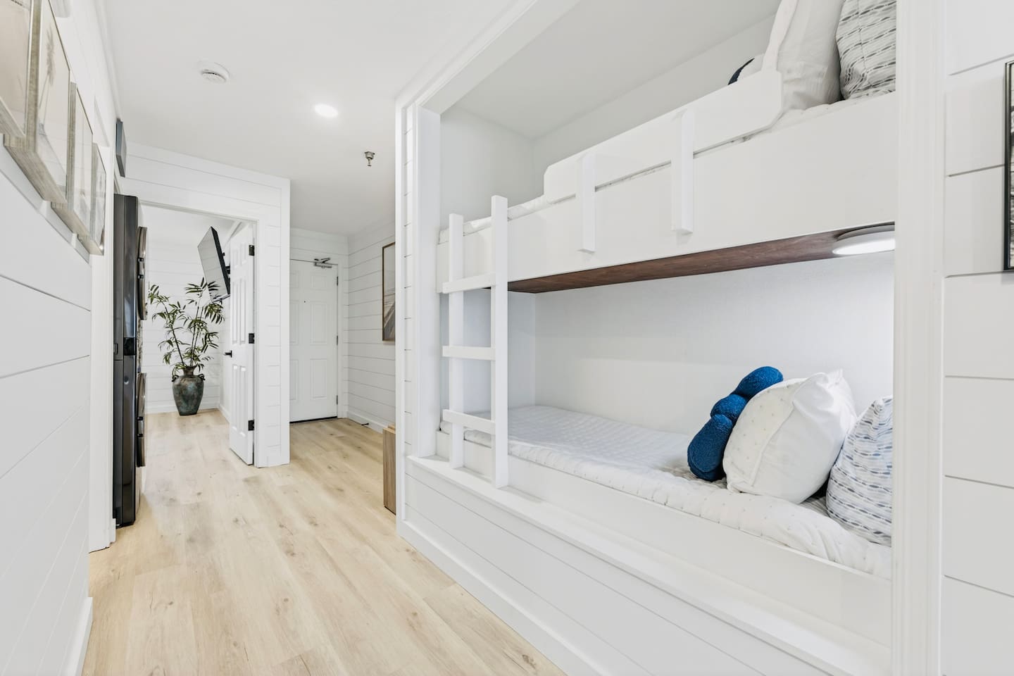 Twin bunk bed in the hallway, with two sleeping spaces for children. The condo has one private bedroom.