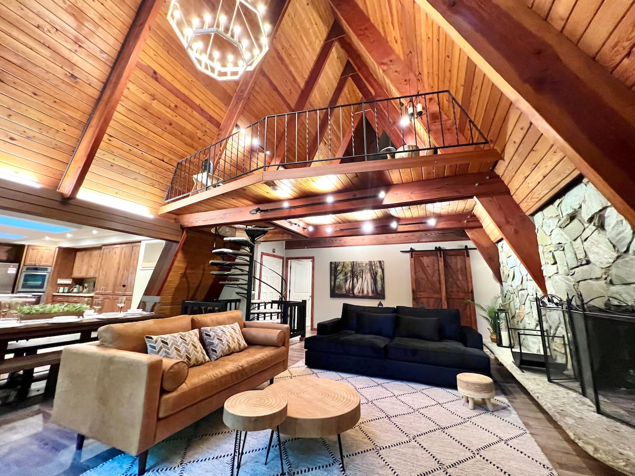 View of living room, loft and kitchen