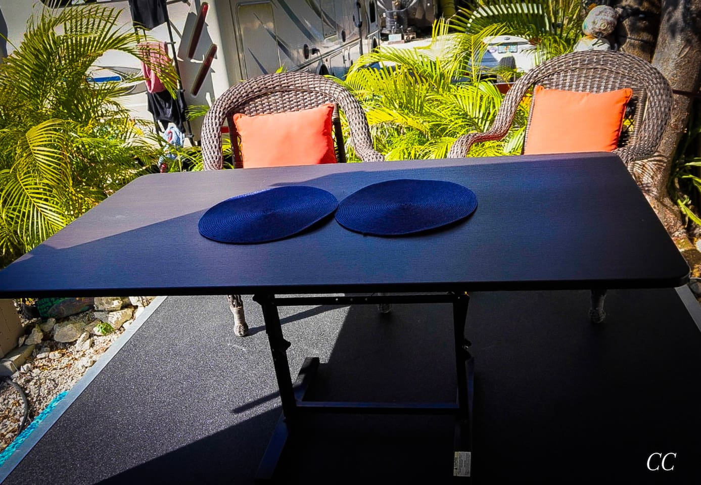 Drop the back wall for additional outside living space. Can use the outside furniture or pull some from the inside out for more space. In the compartment there is a bug screen you can put up and use if needed,