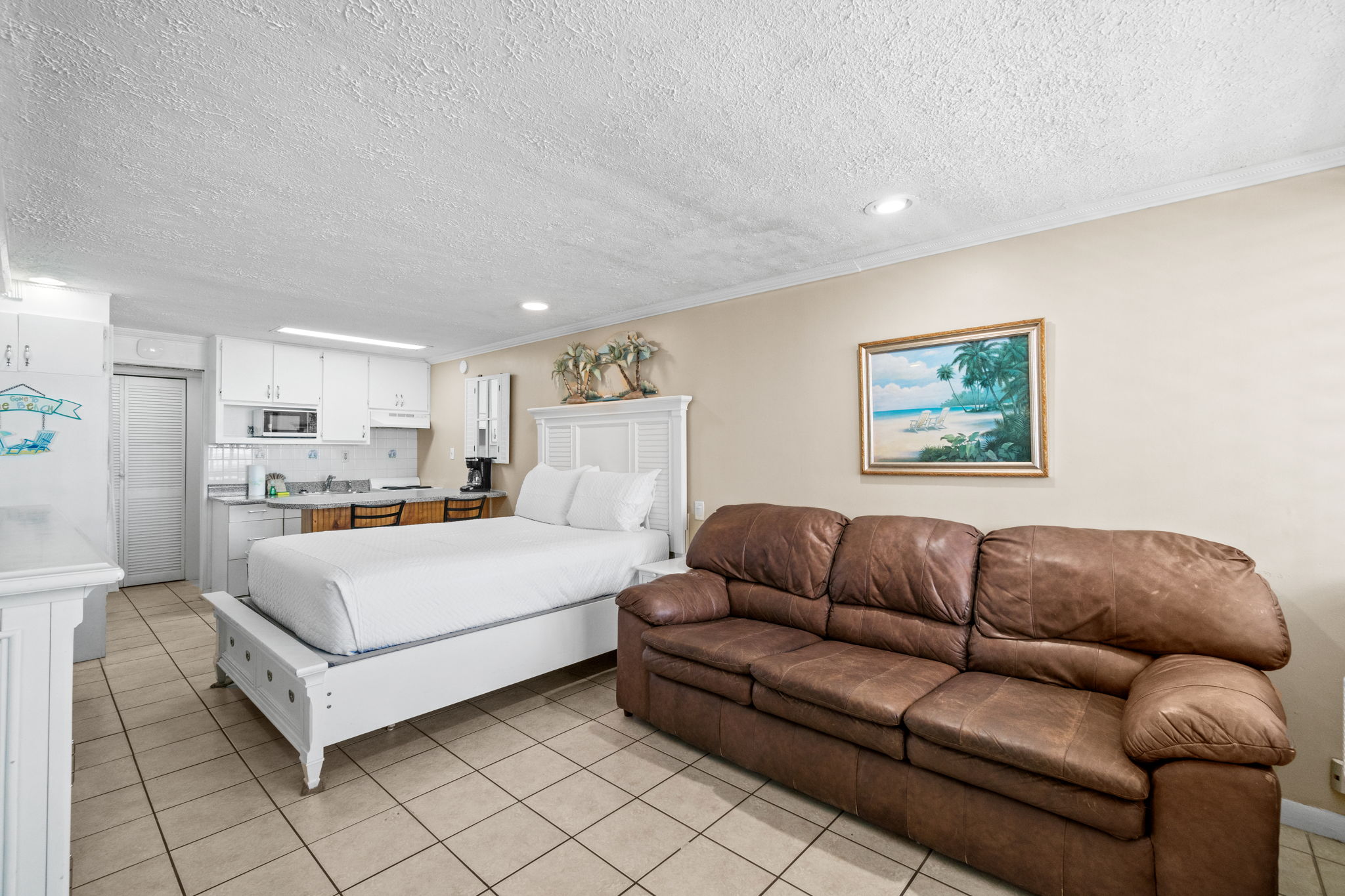 Living Area with Queen Bed and Sleeper Sofa