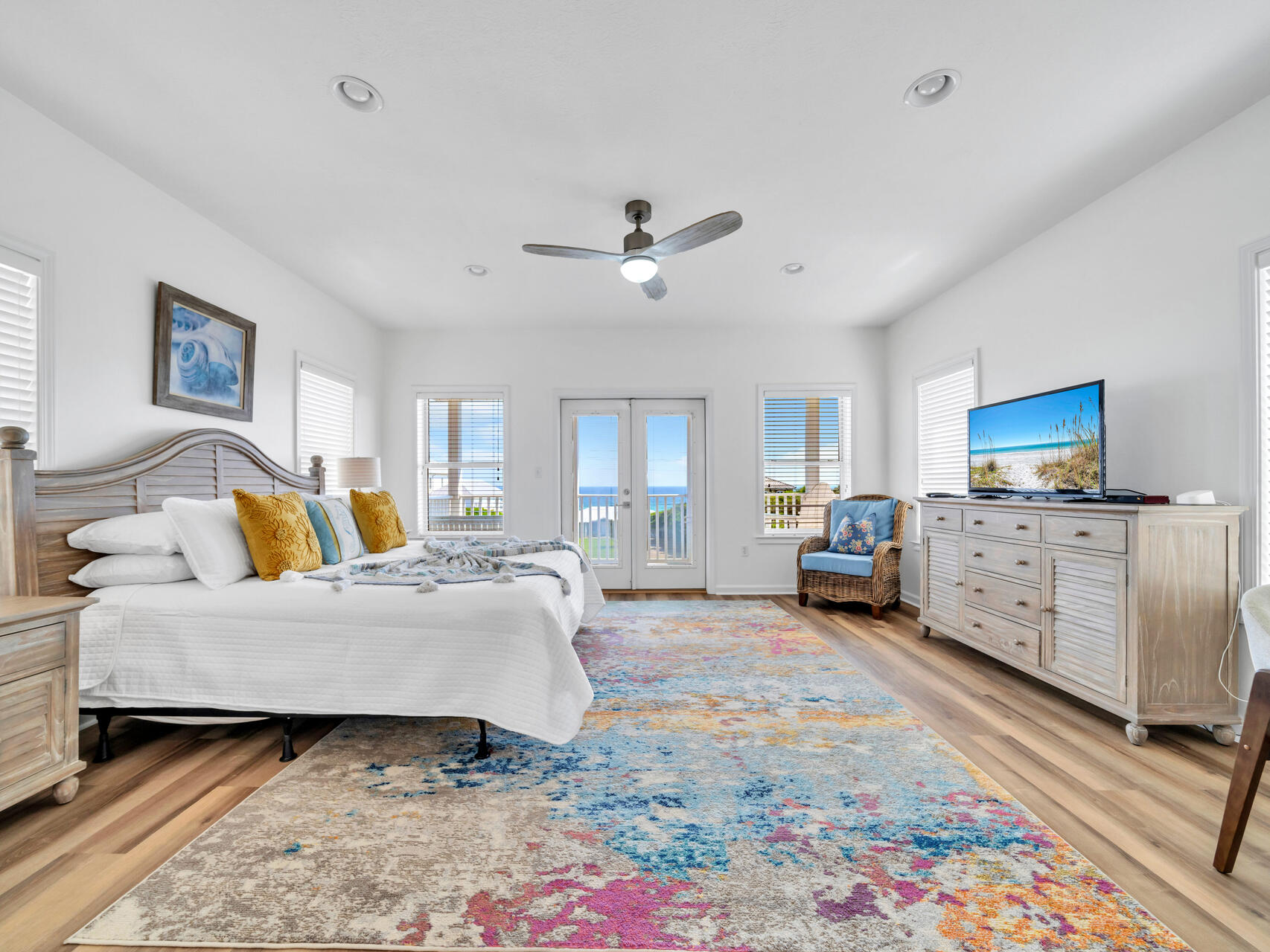 The huge third-floor primary bedroom has an ensuite bath and SPECTACULAR gulf and sunset views!