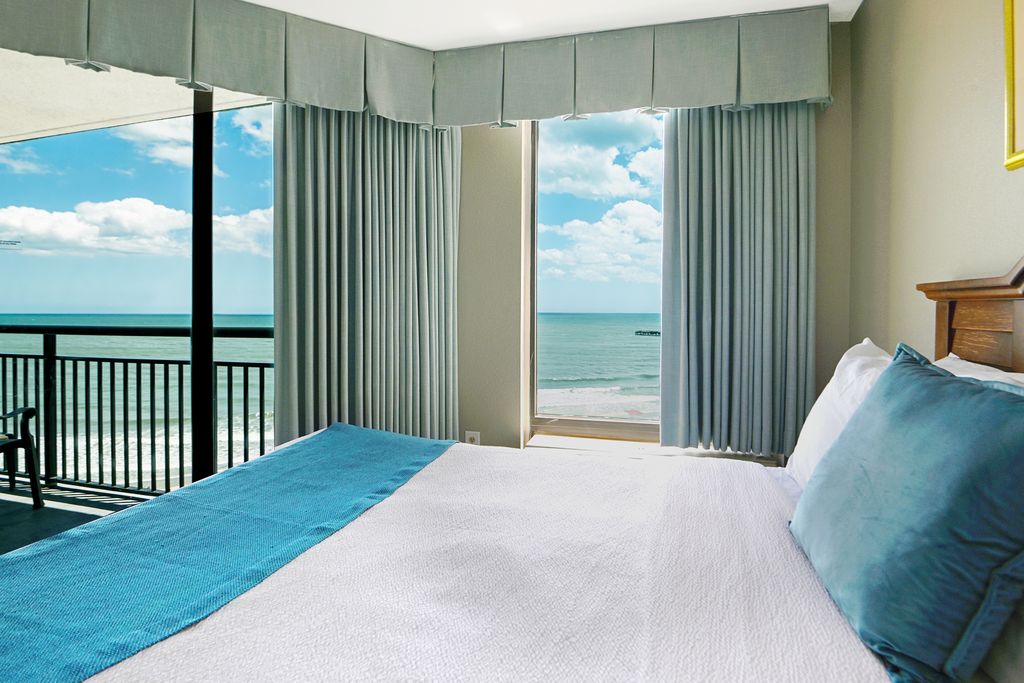 Retreat to an oceanfront haven, where the charm of the beds meets the allure of the sea, providing a delightful setting for a rejuvenating stay.
