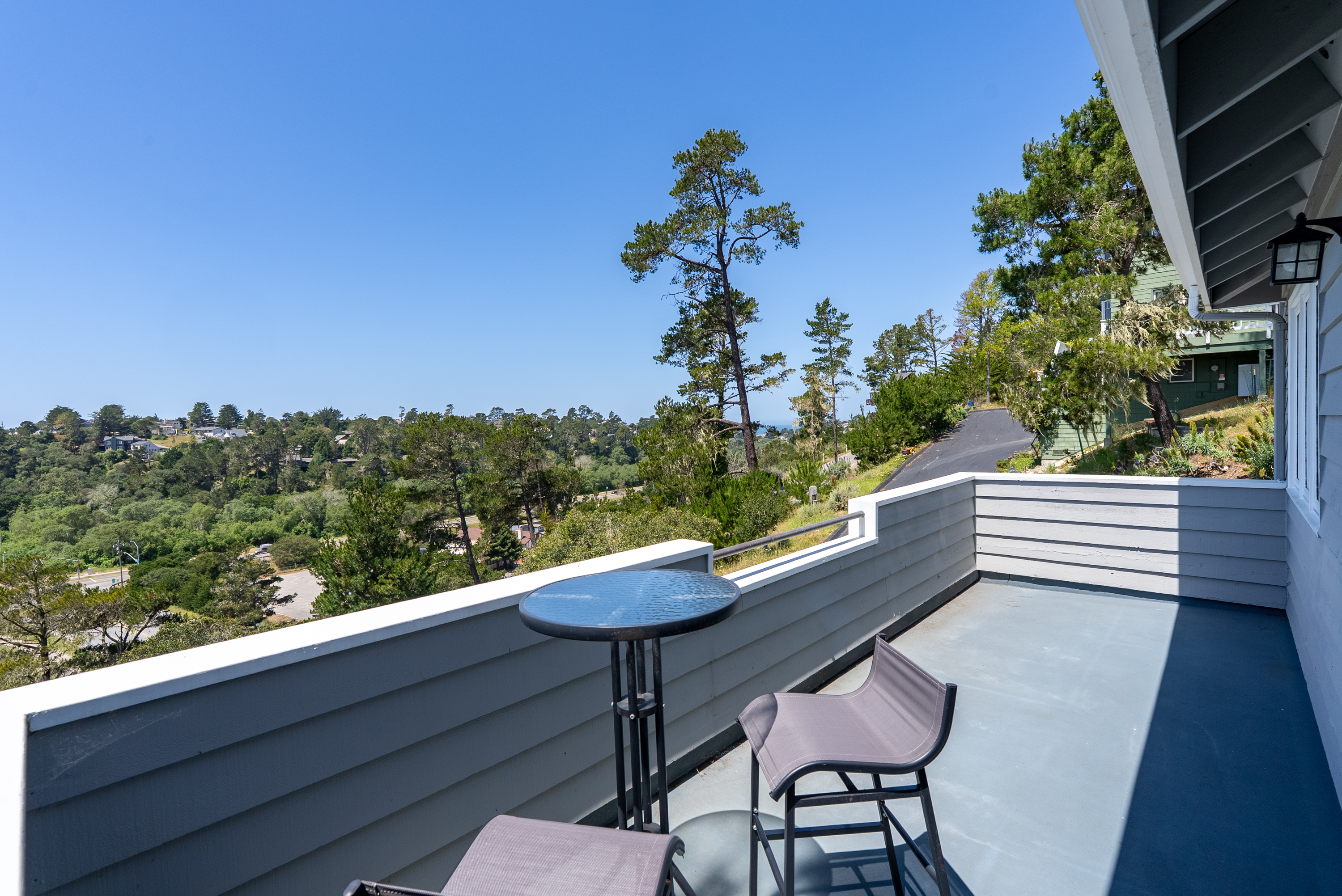 Enjoy your morning coffee on this breezy balcony.