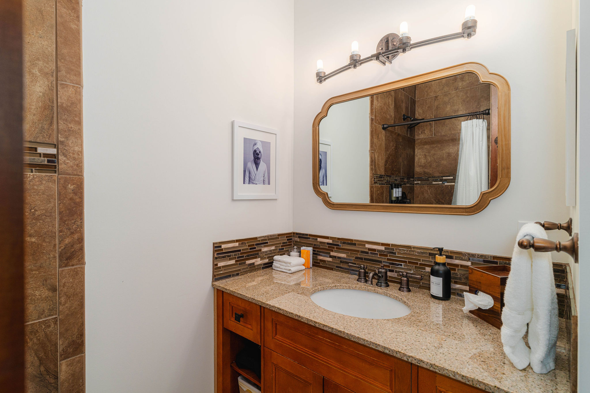 Private ensuite bath with walk-in shower and modern finishes for added comfort and convenience.