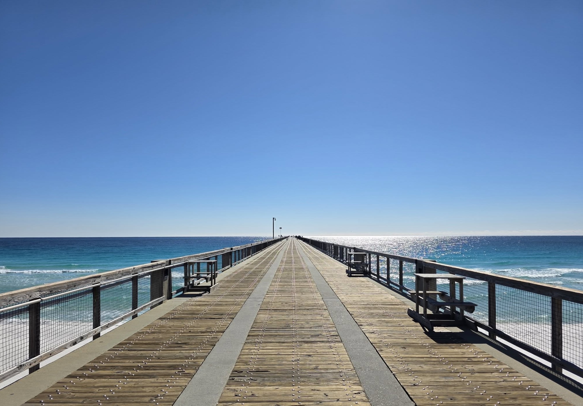 Navarre Beach fishing pier is the longest pier in The Gulf. Spotting sea turtles, rays, sharks, and dolphins is a family favorite!
