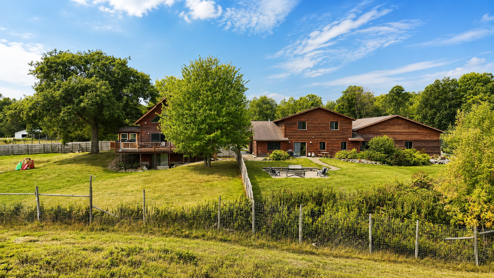 The House and Lodge next to each other show off the impressive size and outdoor space that makes this property truly one of a kind!