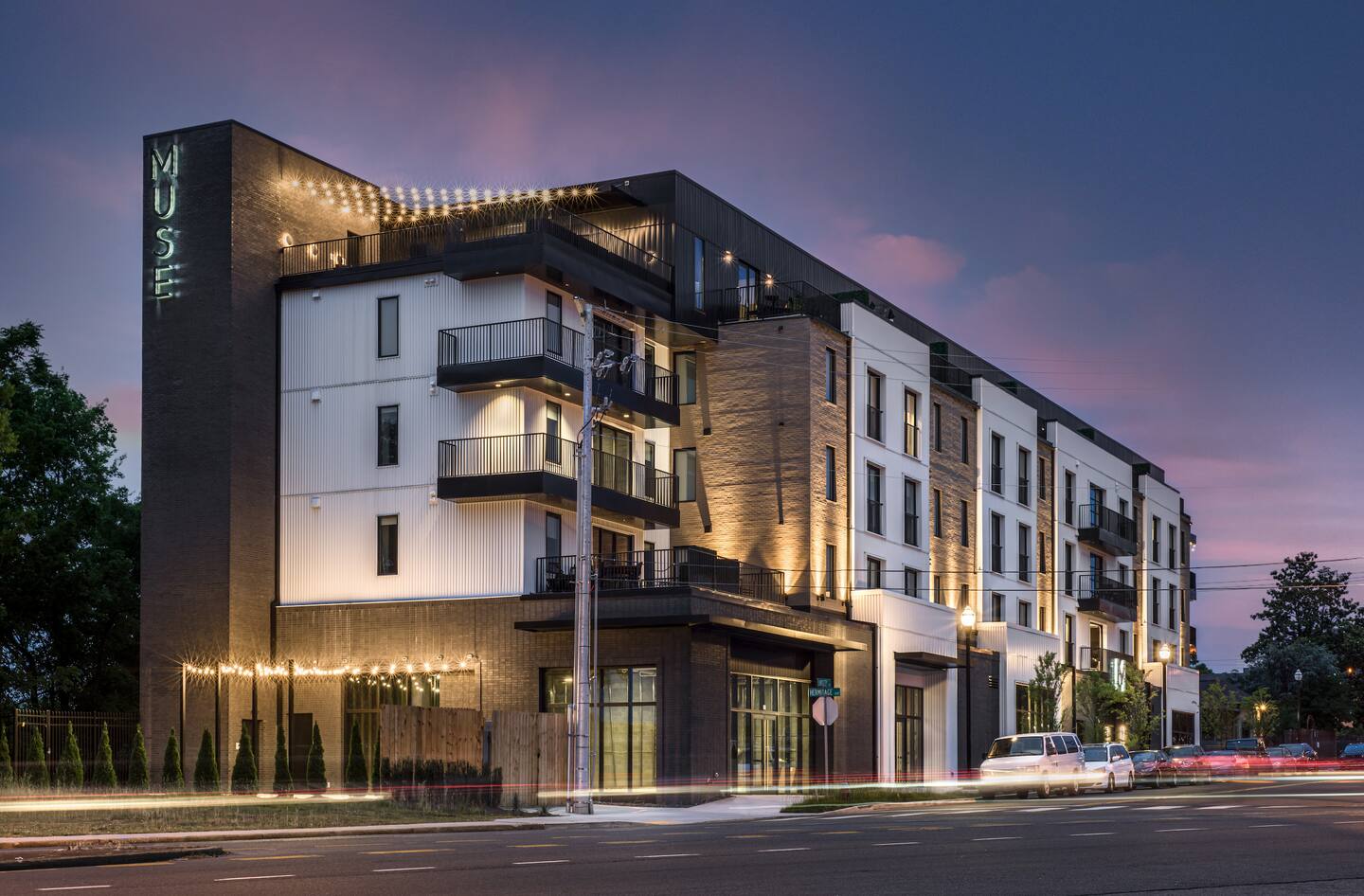 Exterior: Experience modern charm in Nashville with stylish design and vibrant nighttime ambiance!