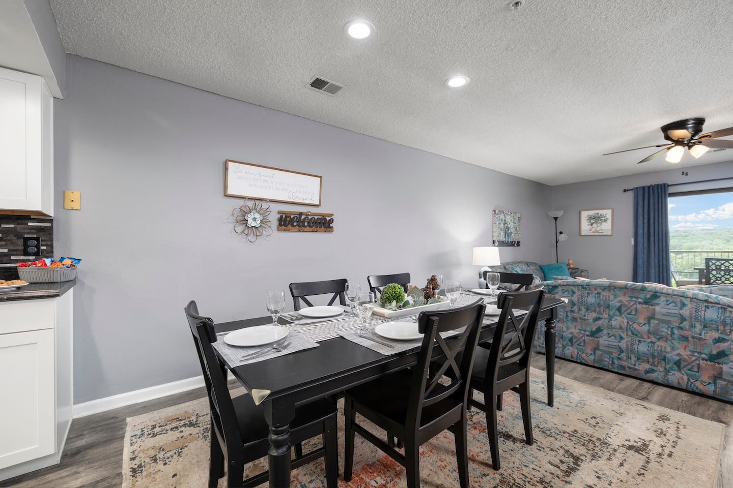 Dining Area: Gather around the stylish table for meals with a view of the stunning Branson hills!
