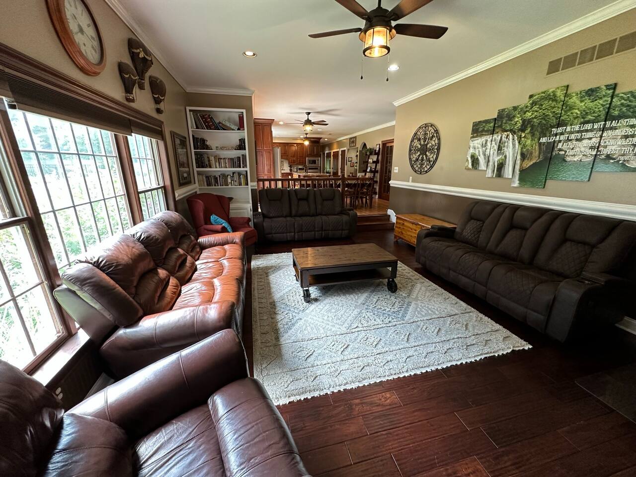 Large Open Family room  (16ft x 24ft) with 10 ft ceiling (view from the fireplace). The wide-open design enables you to see family in the nook and large kitchen.