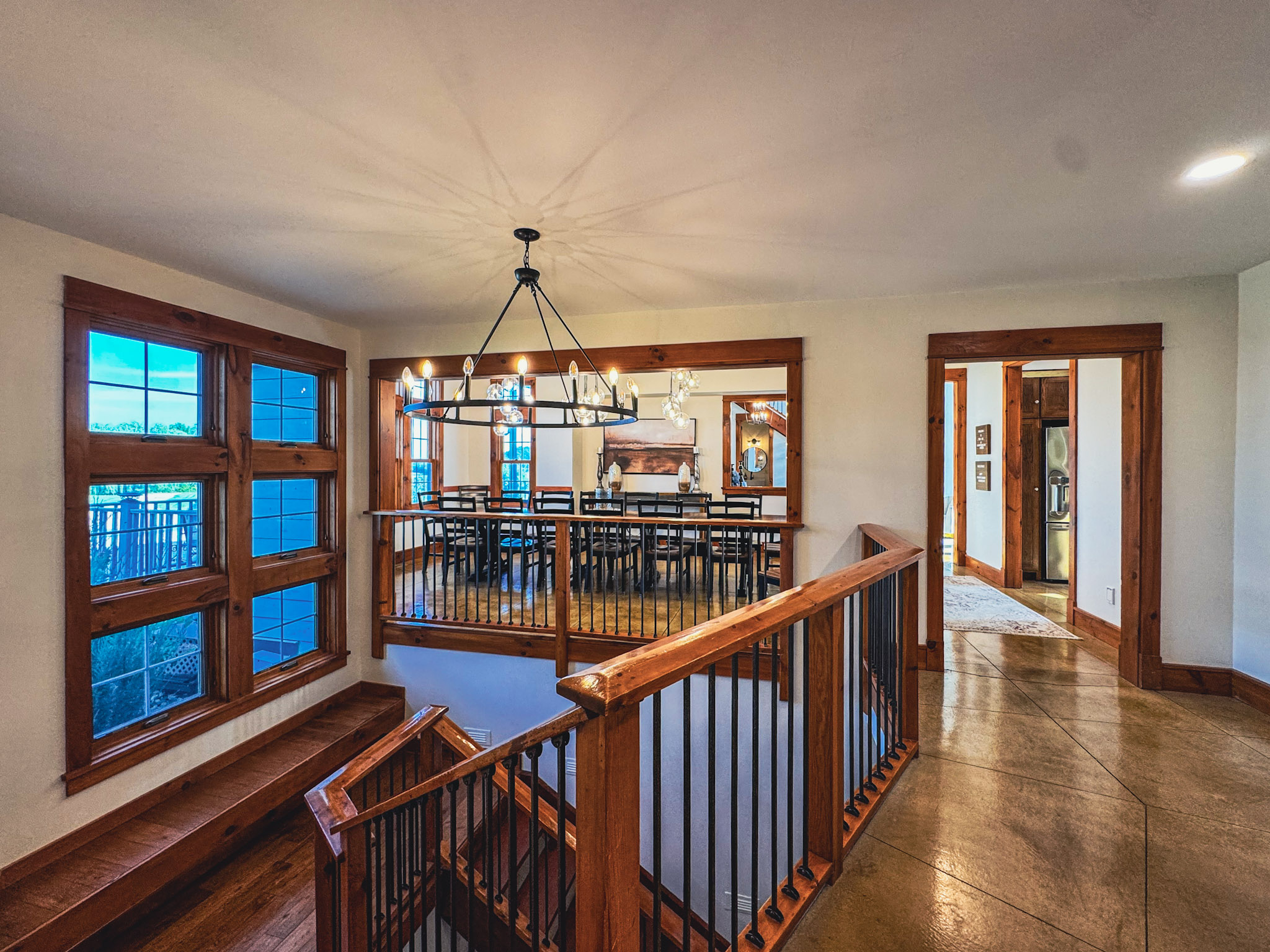 Main-floor hallway and staircase beside the dining room.