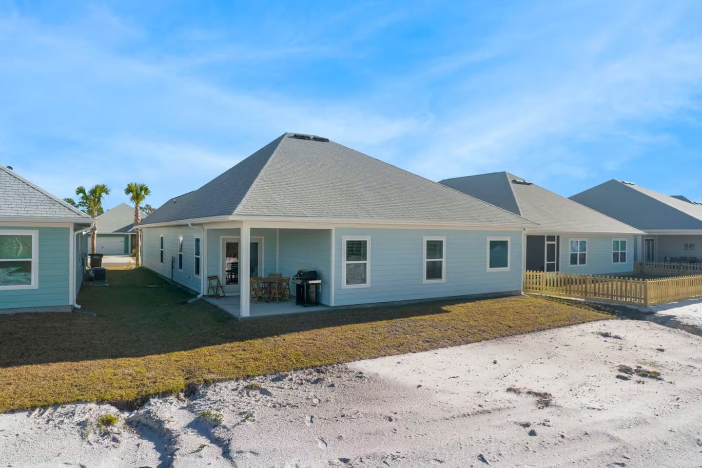 Enjoy easy indoor-outdoor living with this open backyard space.
