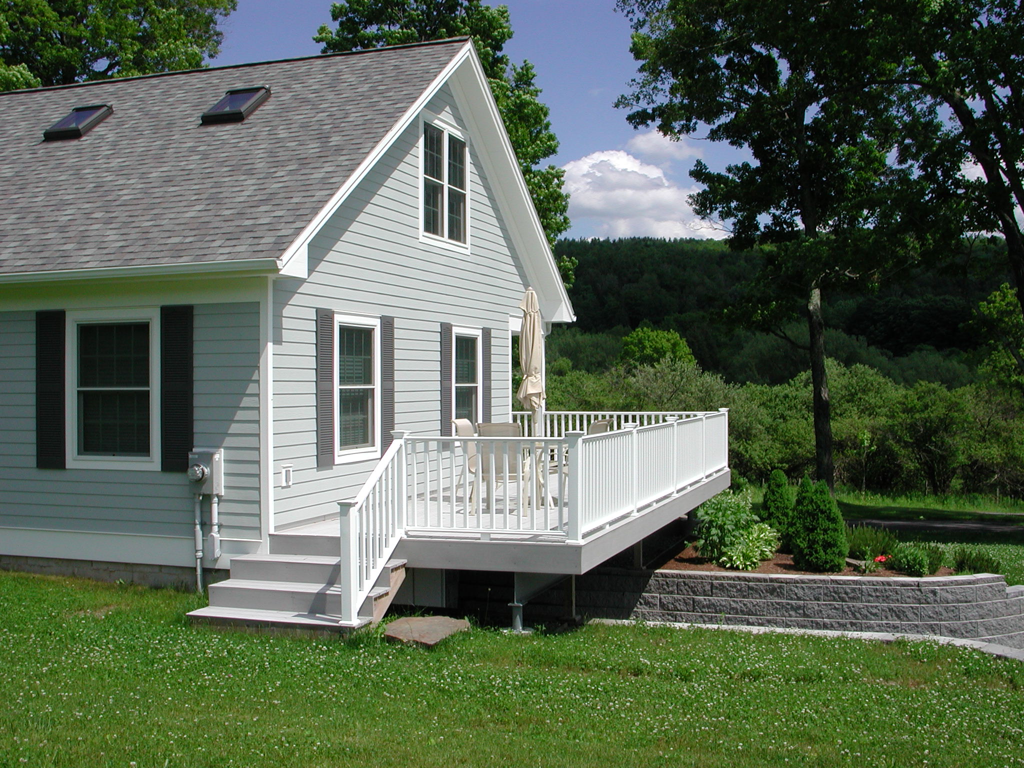 Side porch uncovered portion.