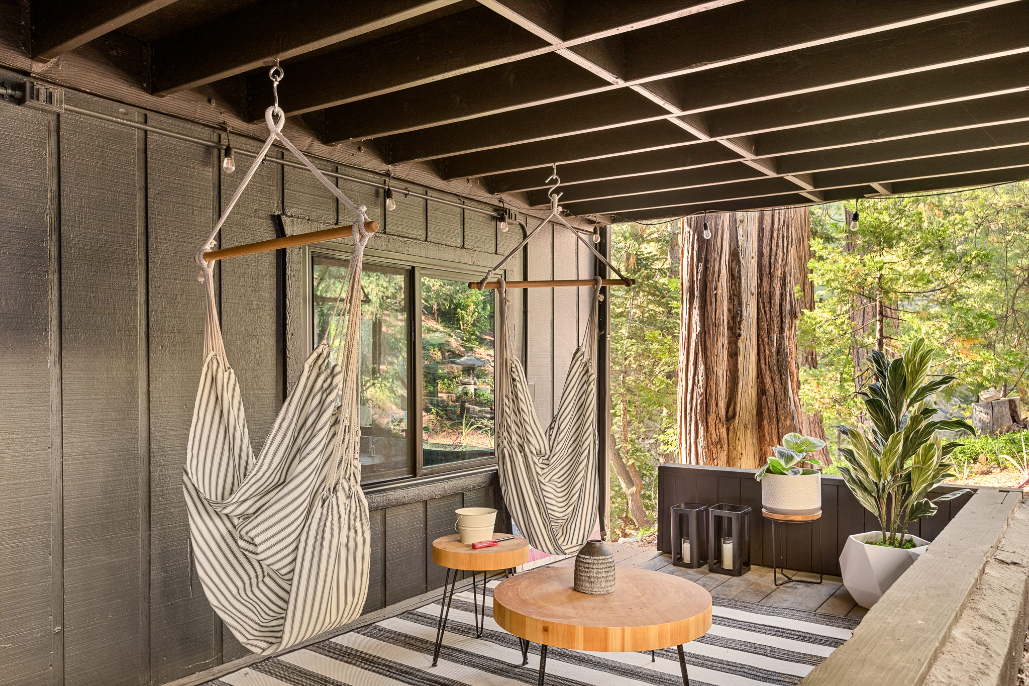 Kick back and relax on the lower deck in these two comfy hammock chairs, the ultimate spot for unwinding and soaking in the tranquility.
