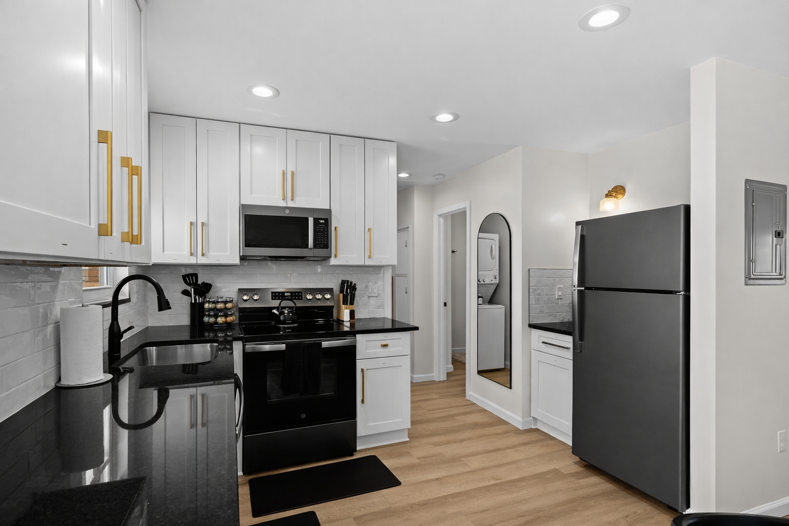 Sleek, modern kitchen with stainless appliances, ample cabinetry, and bright lighting—designed for effortless cooking and everyday comfort.