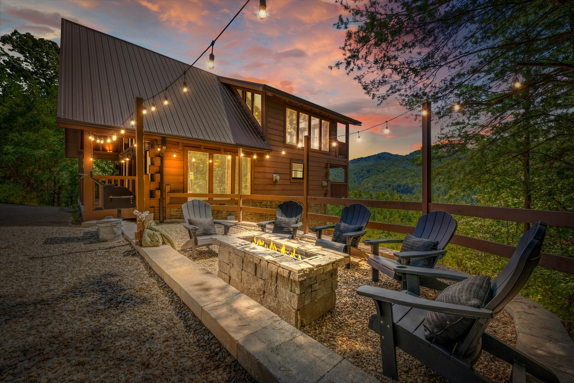 Dusk by the fire pit with sweeping Smoky Mountain views.
