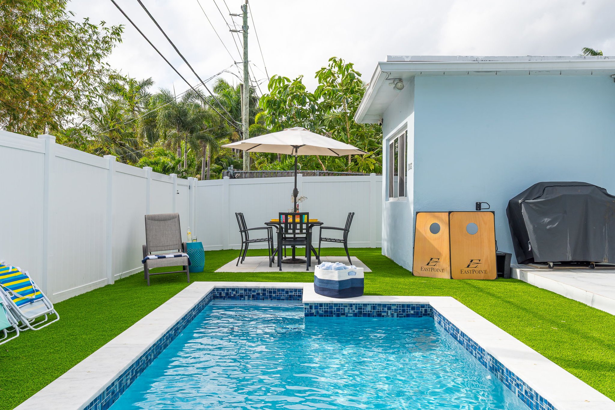 Enjoy your own private pool and hot tub, gas fire pit lounge, outdoor dining, and games—ideal for families and groups seeking a fun Florida escape.