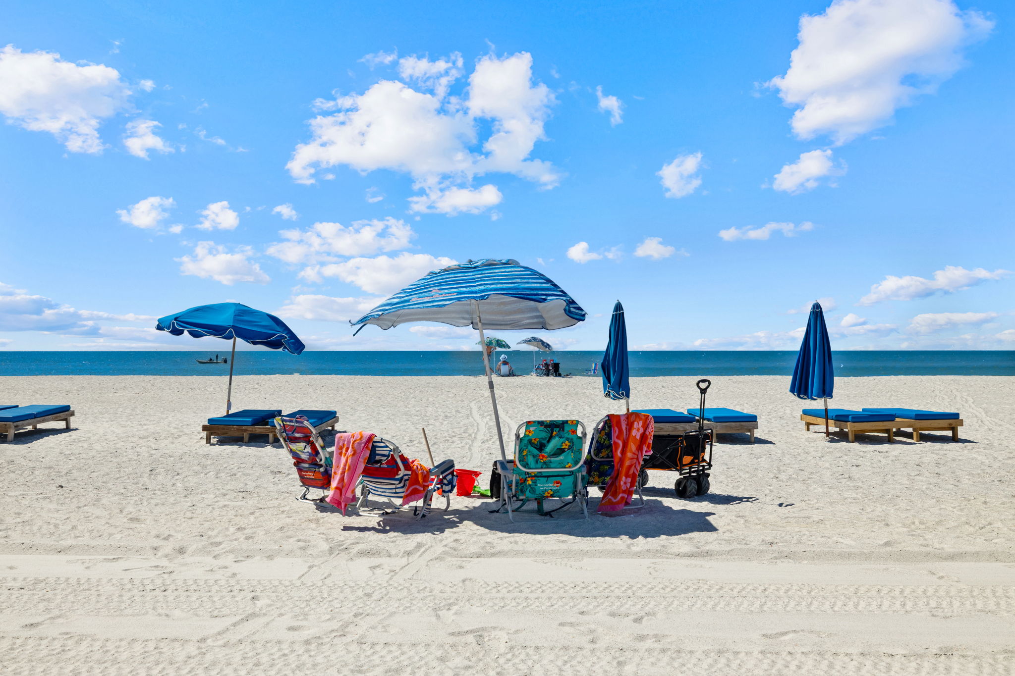 We provide 4 beach chairs, umbrella, and cooler.