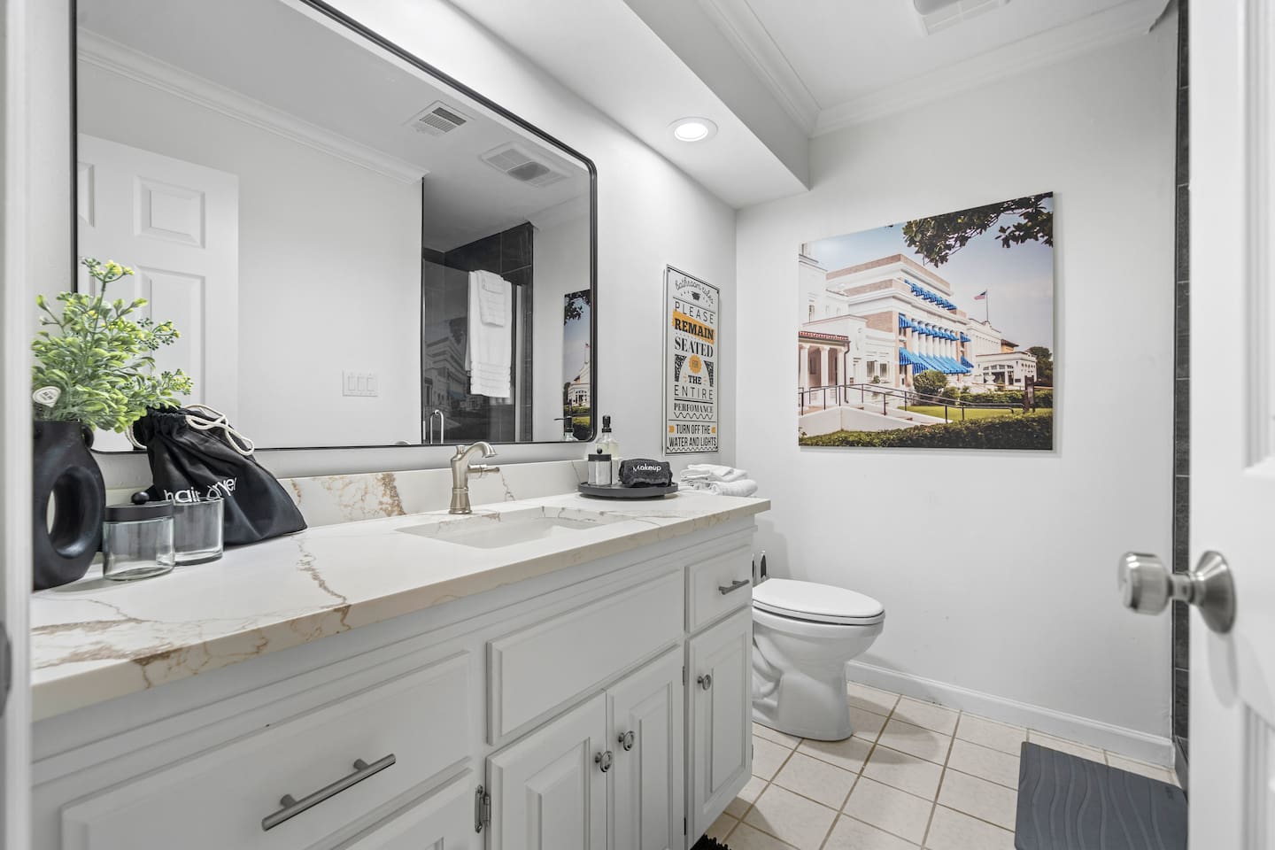 The 3rd Full Bathroom is in the Hall in the Lower Level. 