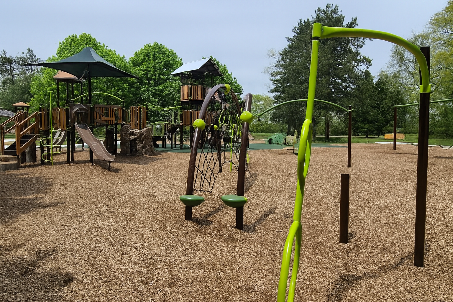 Expansive Play Area with Slides, Swings & Climbing Fun – Bay Court Playground Has It All!