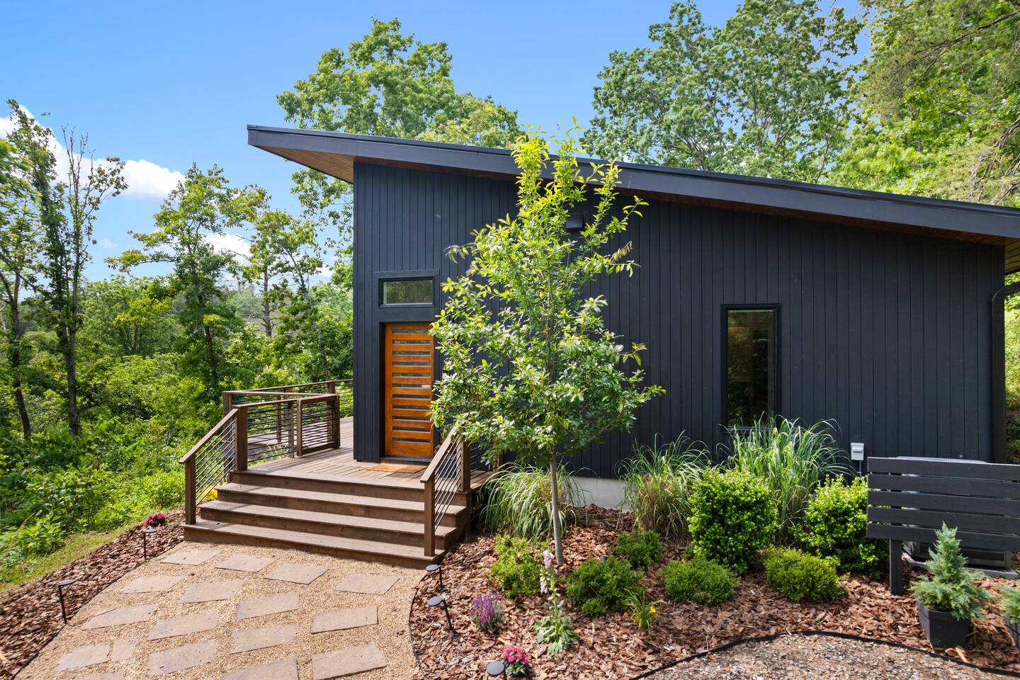 Front entrance leads to the expansive deck. 