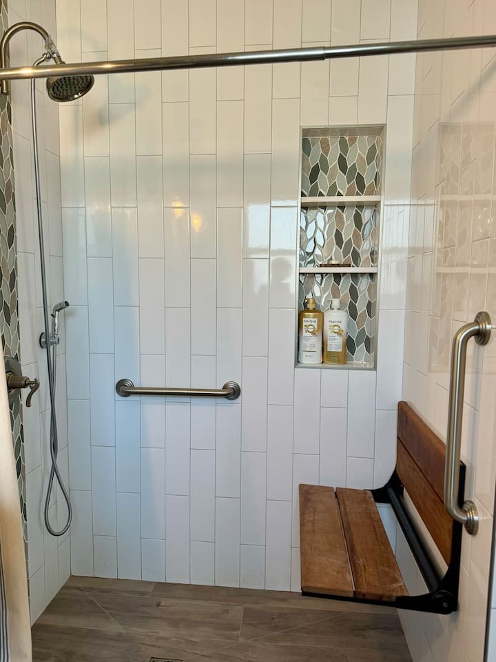 Stylish and functional—this modern bathroom blends elegance with practicality for a cozy, refreshing space, Btw, it’s handicapped accessible if you need that! - Tanya (2021)