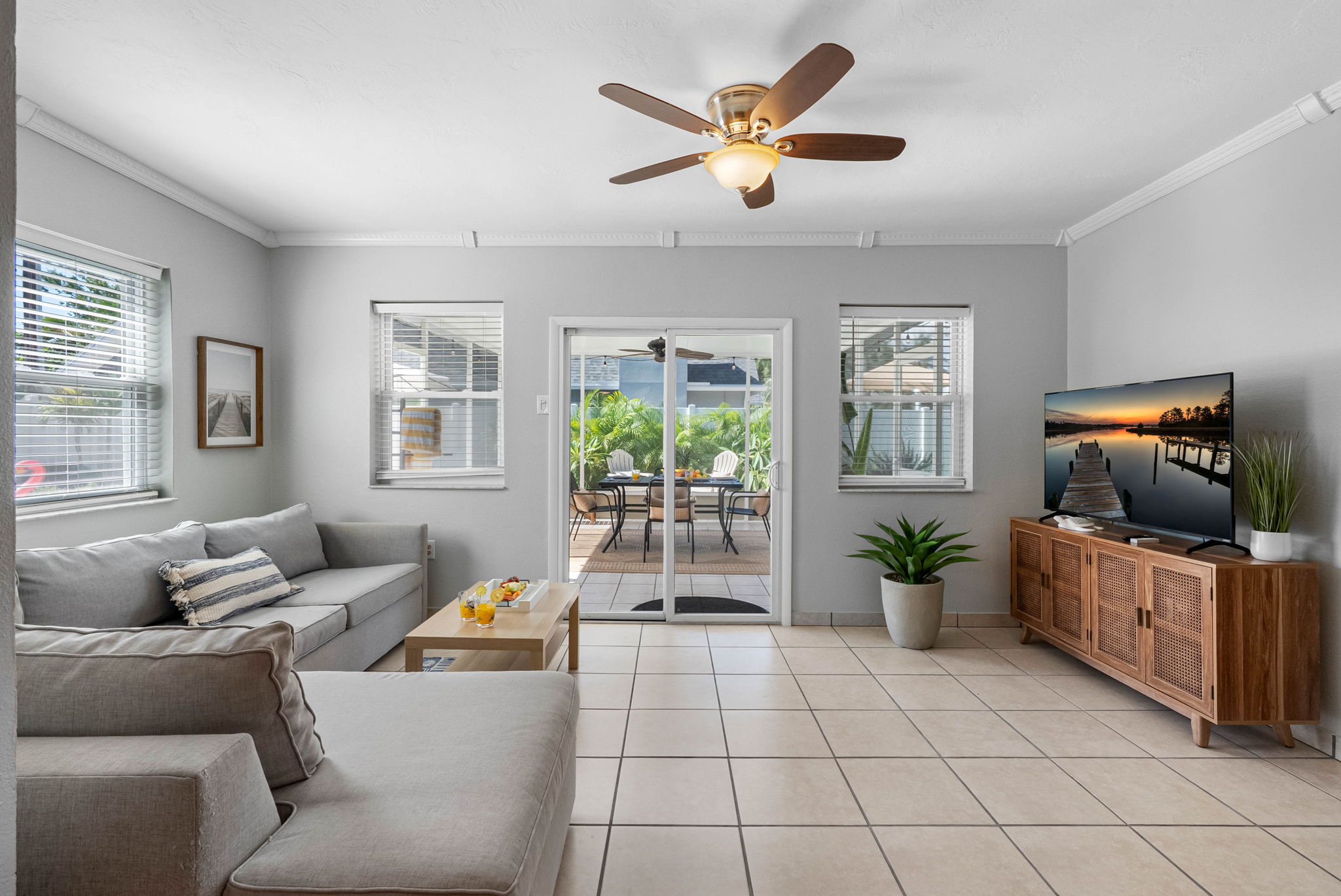 Feel instantly at home in this peaceful living space, where a calming color palette and soft seating invite you to relax.