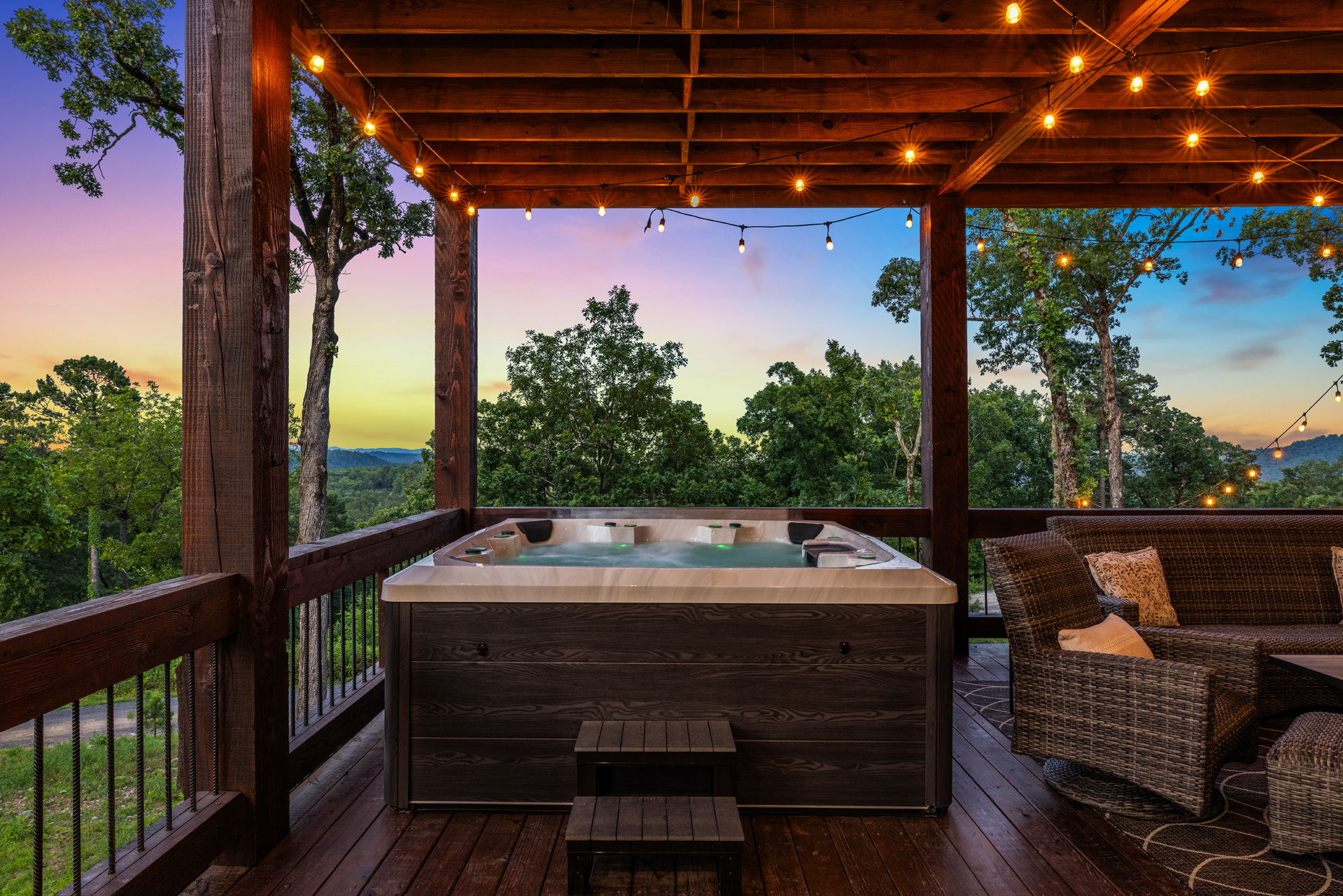 Private hot tub retreat with sunset views and relaxing outdoor seating