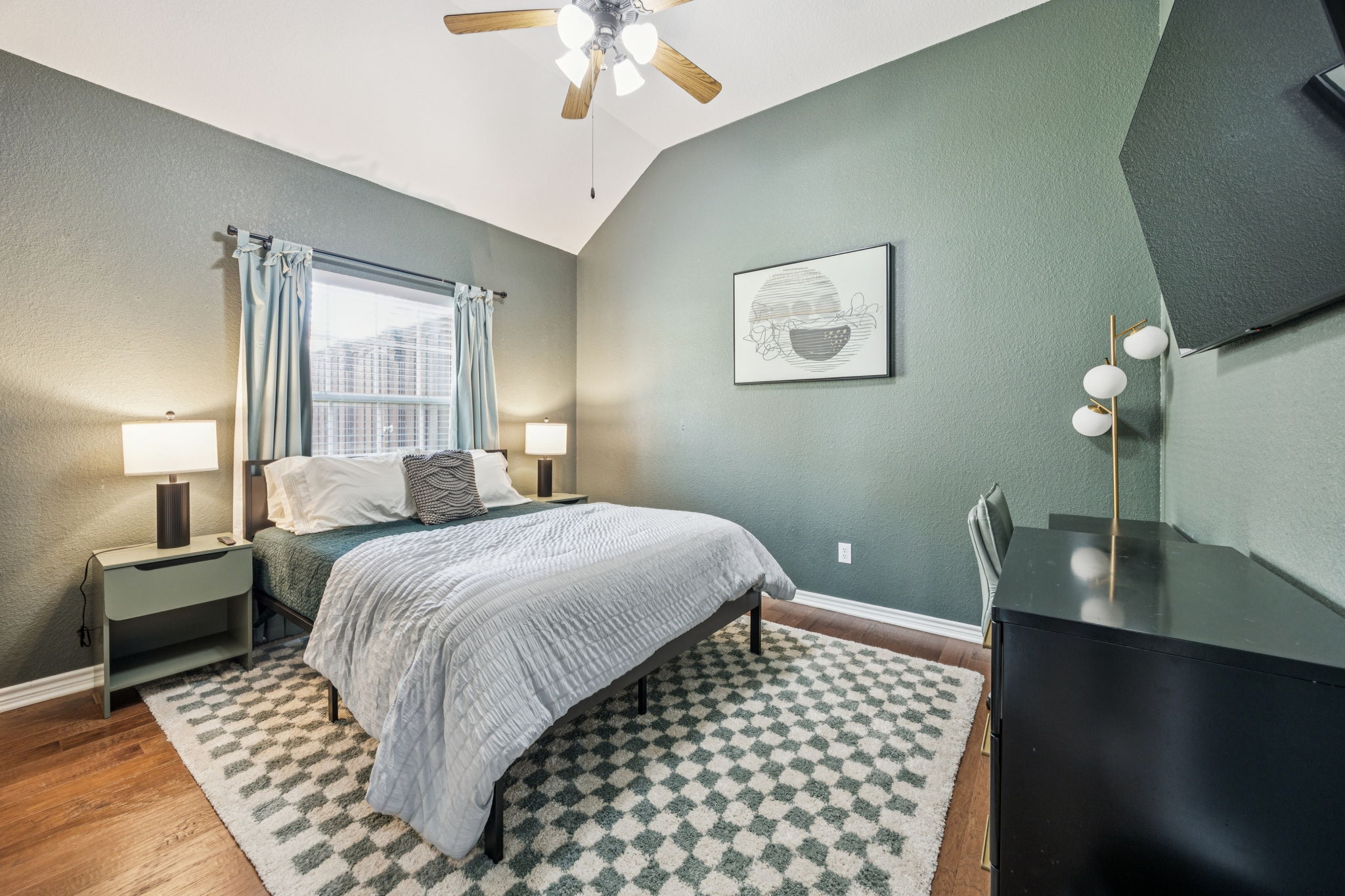 Queen bed with stylish, relaxing décor, 55” Smart TV for movies or shows in bed, and a desk if you need to get work done.   
