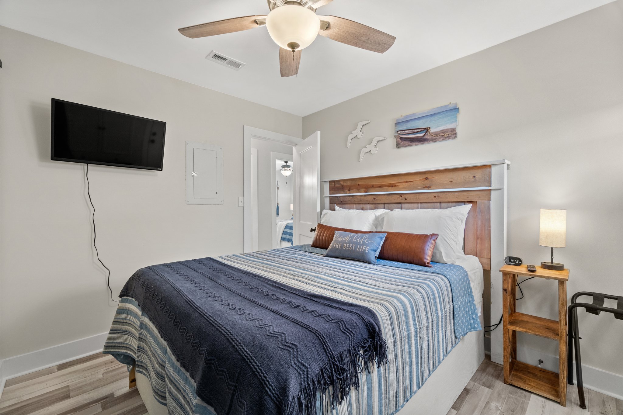 Wake up in paradise every morning in this fantastic beach house queen bed!