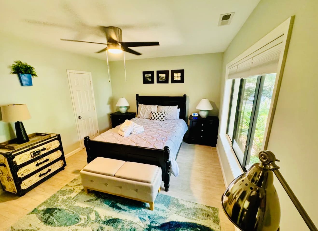 Primary bedroom with four-poster bed