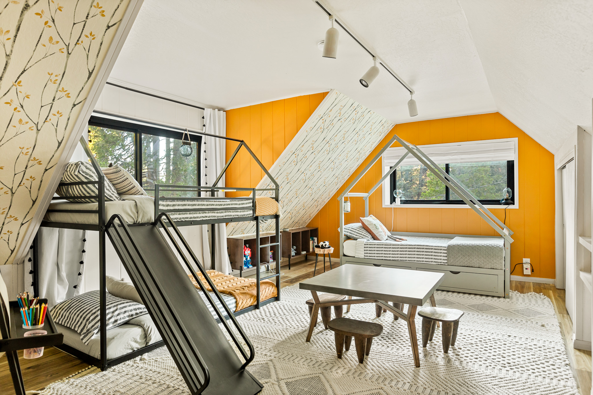 The kids' room offers a perfect space for your little ones to have their own unique area for play and exploration!  And guess what? The single twin bed converts into a full king size bed!