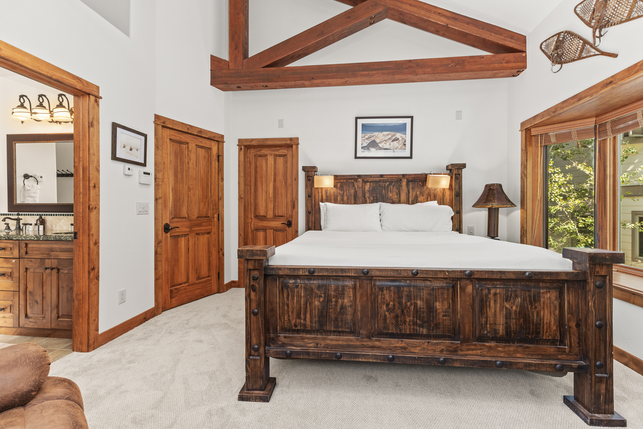 Top Level - Ensuite King Bedroom 1 with Bathroom Entrance in Photo