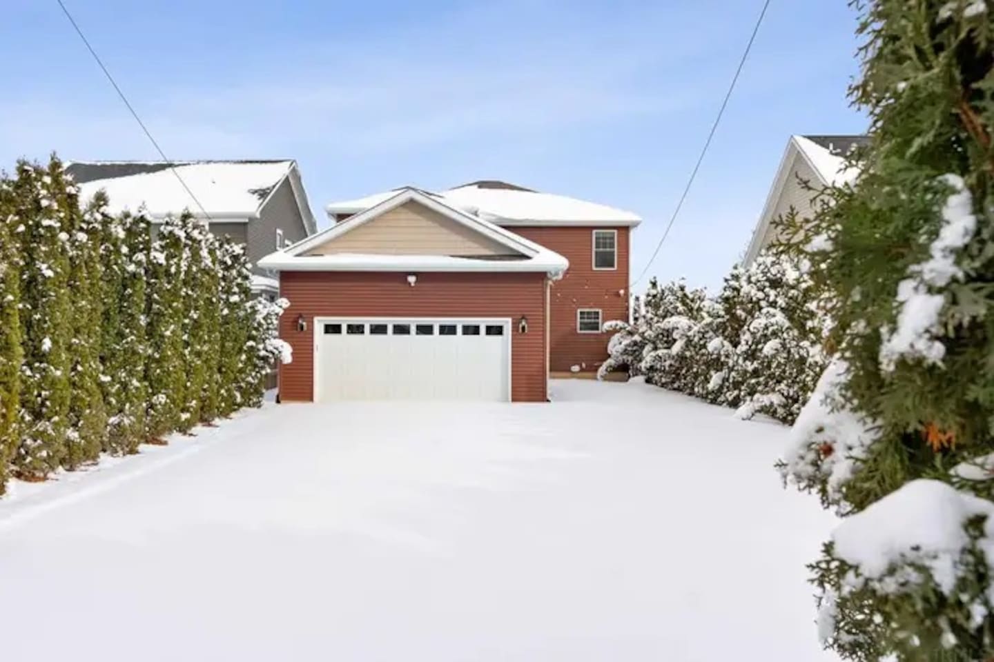 Large private backyard lined with beautiful privacy trees and fully fenced in. Large Lawn area as well as a large parking area. There is enough room for 5 cars leaving plenty of room to enjoy the backyard.