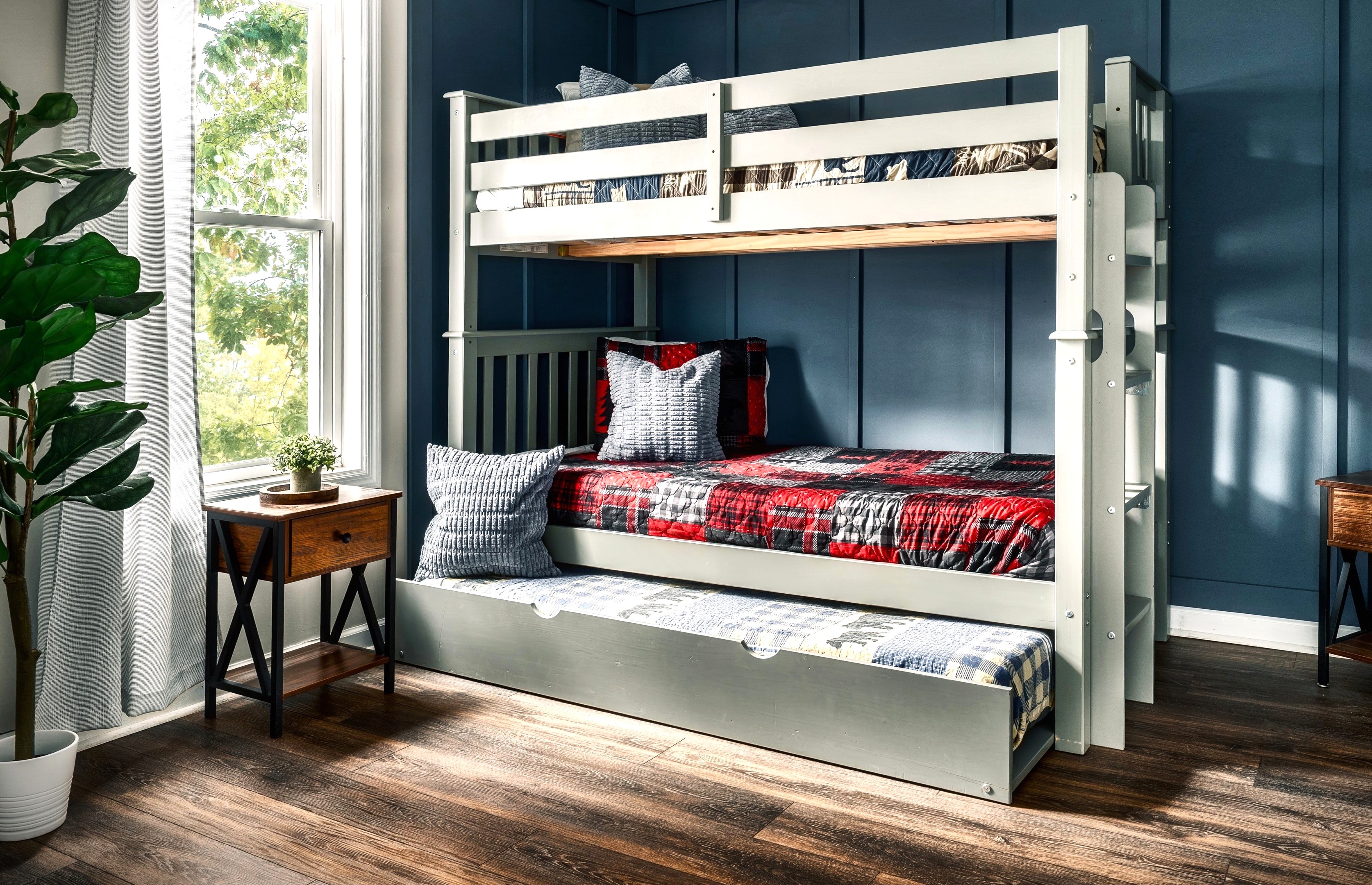 Wake up to a warm sunshine and breathe in the fresh, crisp mountain air. This cozy main-floor secondary bedroom features a twin size bunk bed with a trundle - Sleeps 3.