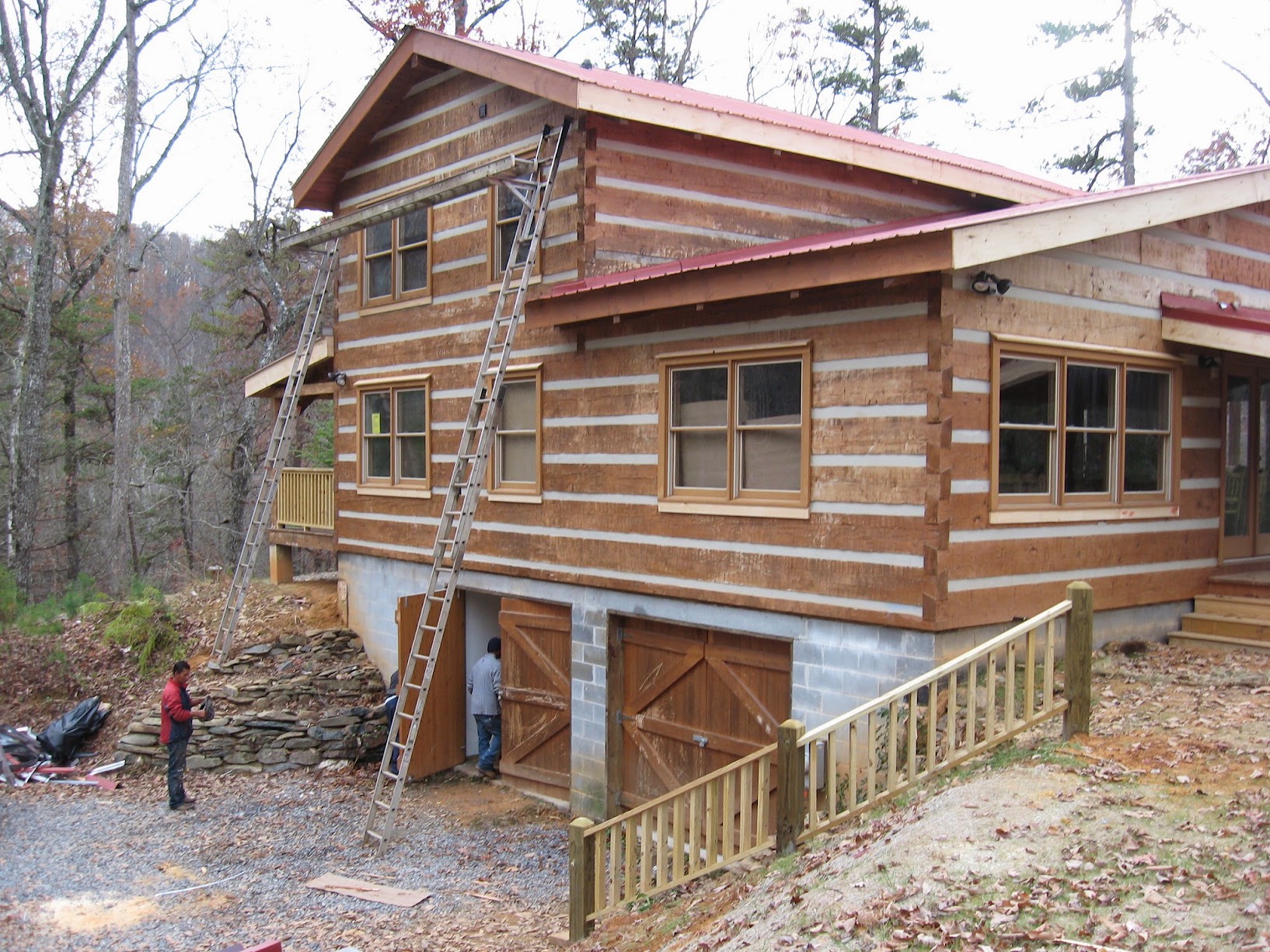 Appalachian Escape unfinished log cabin shell before renovation