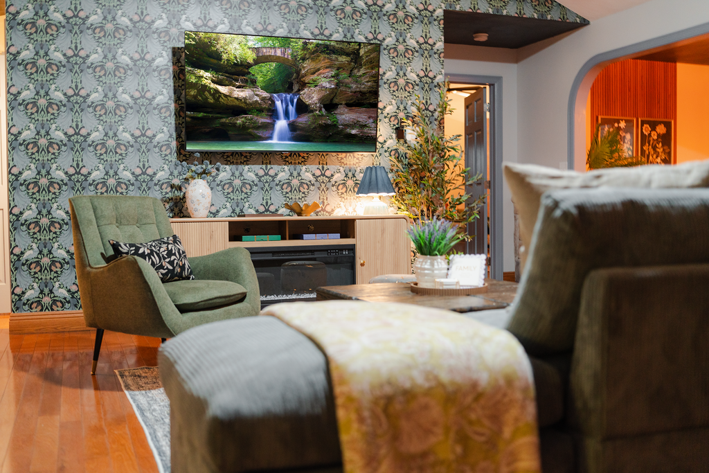 A comfortable living area with a large TV and plenty of space to relax indoors.