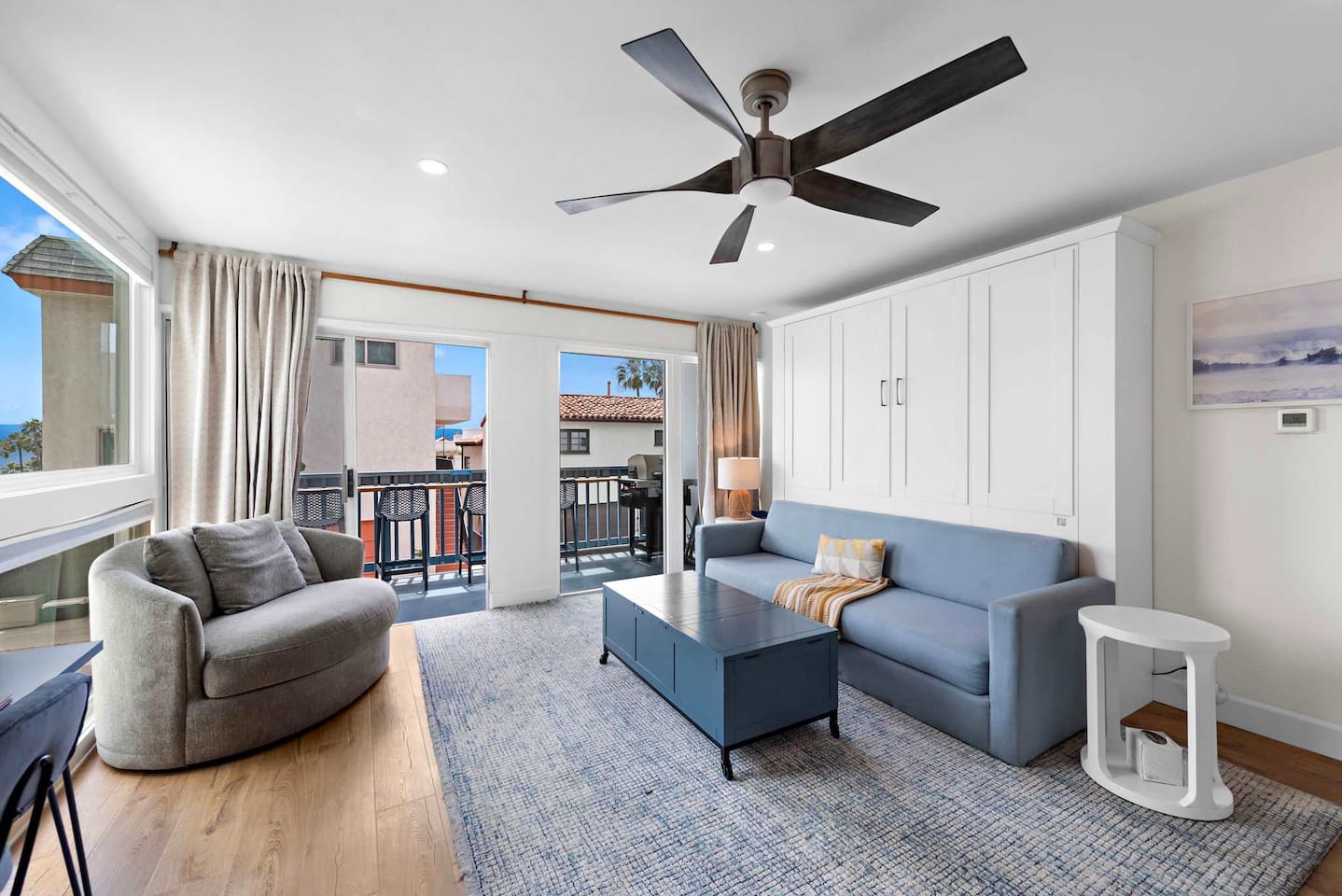 Casa Capistrano Condo 5's living room includes a king-sized sofa Murphy Bed that converts to a "real bed" in less than one minute.  The bed is made up with bedding ready for sleep.  This murphy bed makes this 1 bedroom loft feel more like a 2 bedroo